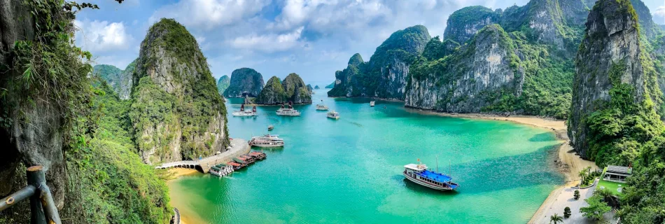 a group of boats floating on top of a body of water