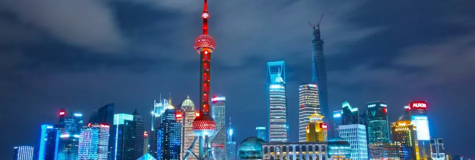 architectural photograph of lighted city sky china tour packages