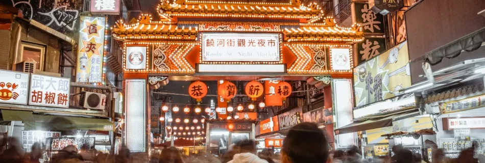 group of people walking at street in Taipei