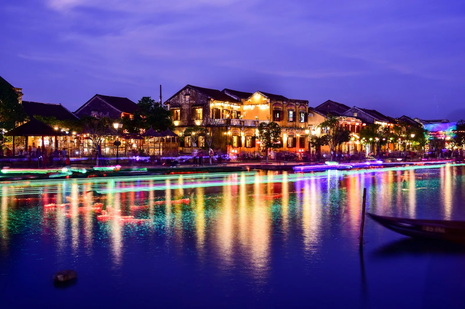 panoramic photography of house in front of body of water in hoi an, vietnam tour