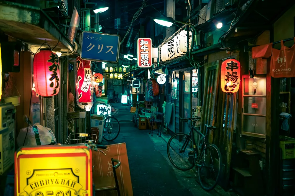 empty pathway in between stores tokyo